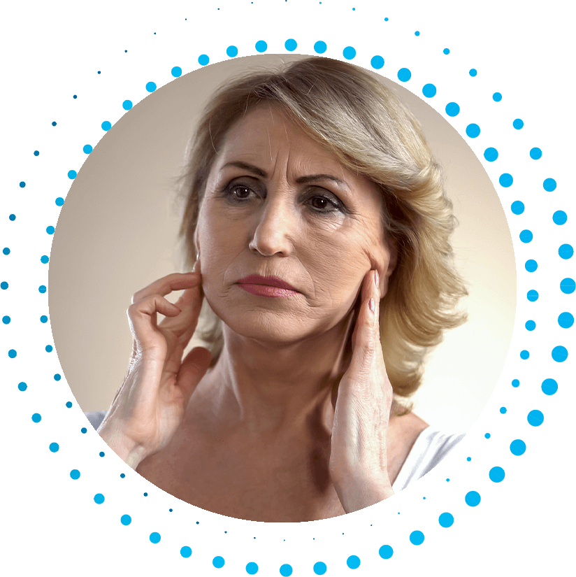 botox patient looking at wrinkles in mirror